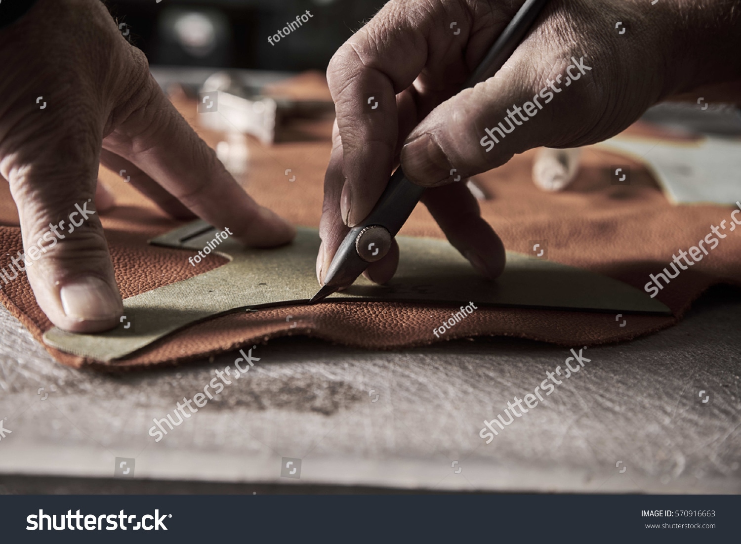 stock-photo-shoe-production-process-in-factory-570916663.jpg